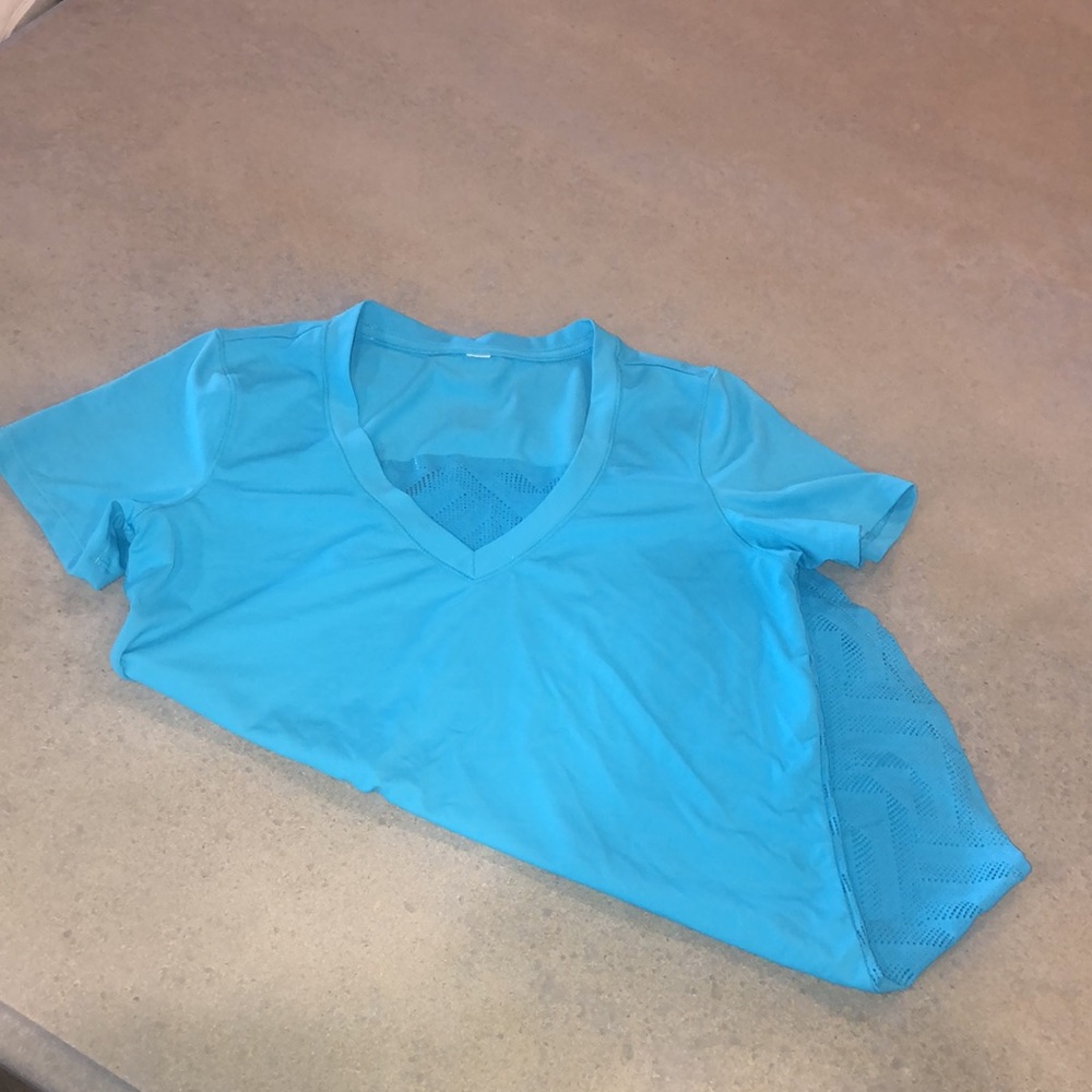 Under Armour | ladies turquoise blue, dri fit tee in Medium